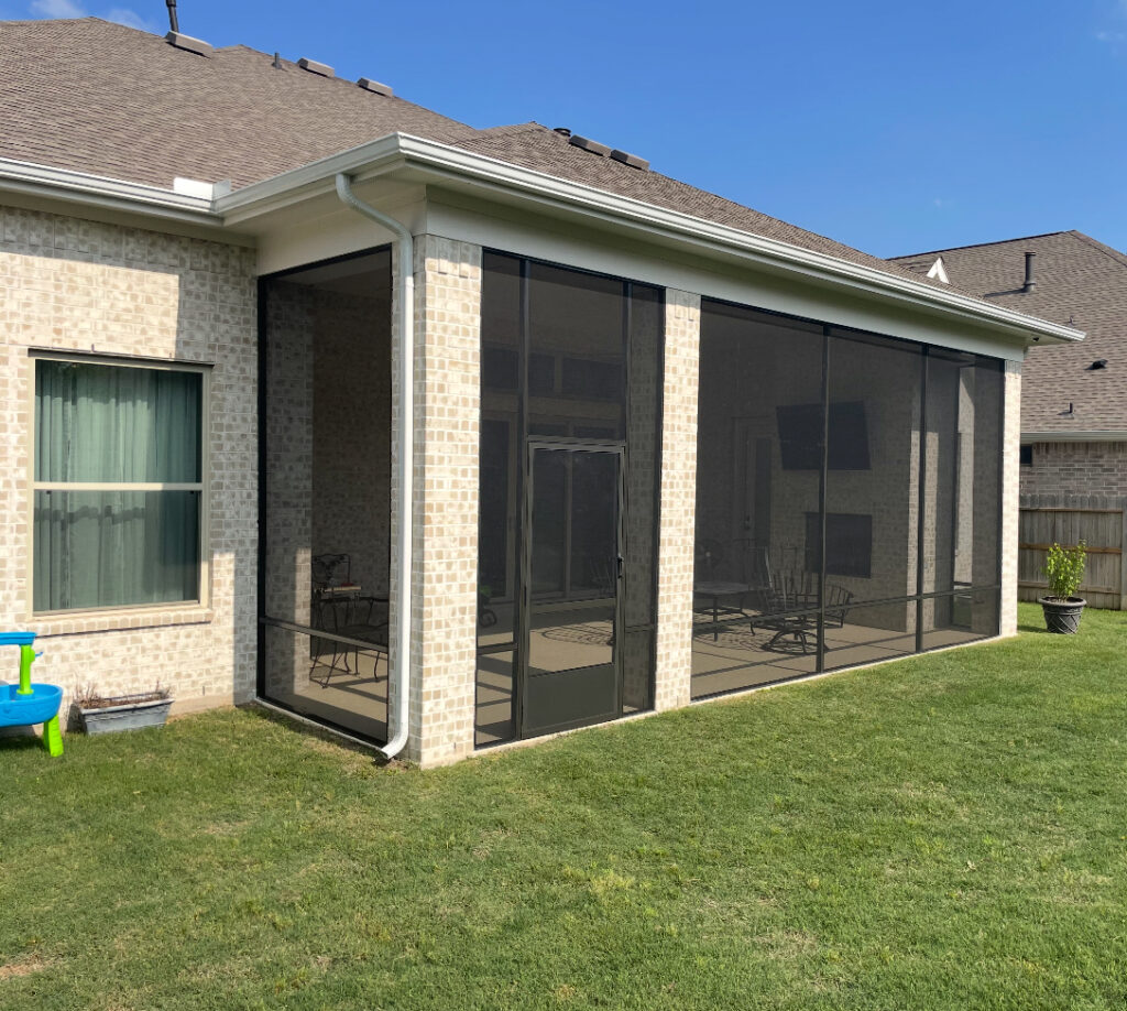 Modern screened-in patio enclosure built by Metal Masons in Montgomery County, perfect for outdoor relaxation and mosquito protection.

